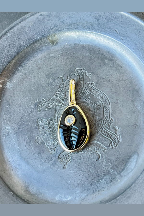 Thatch Cowrie Onyx Charm