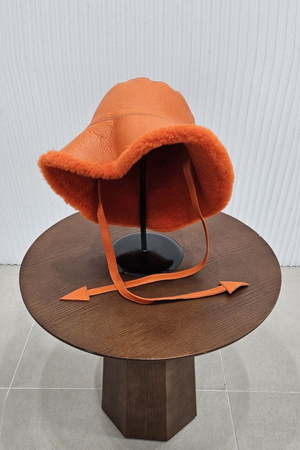 The NKC Store Orange Reversible Lamb Shearling Bucket Hat - Orange