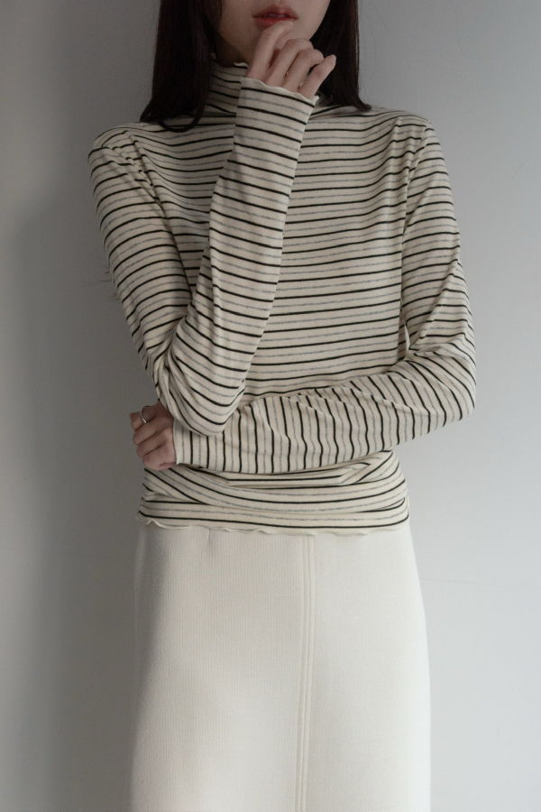 The NKC Store Cathie Turtleneck Top