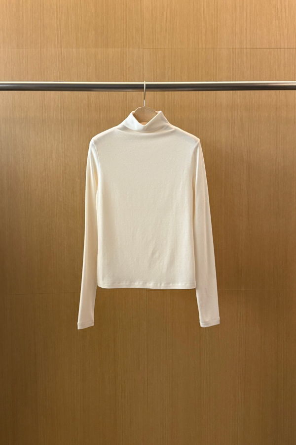 The NKC Store Eve Turtleneck Top