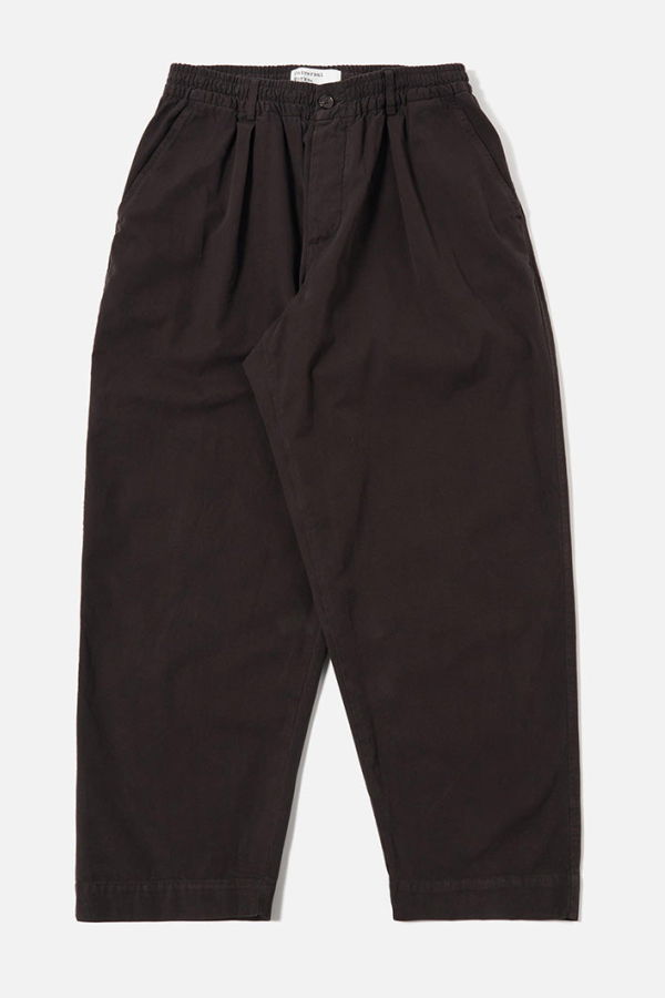 Universal Works Pleated Track Pant in Licorice Canvas Trousers