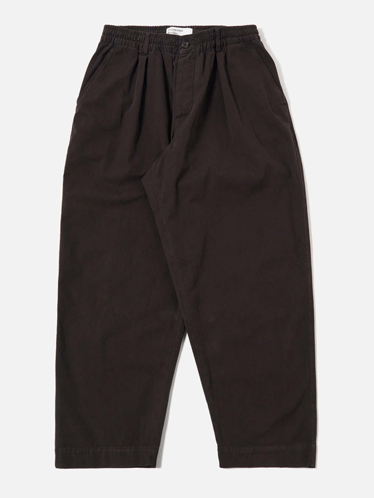 Universal Works Pleated Track Pant in Licorice Canvas Trousers - Image 1 of 5