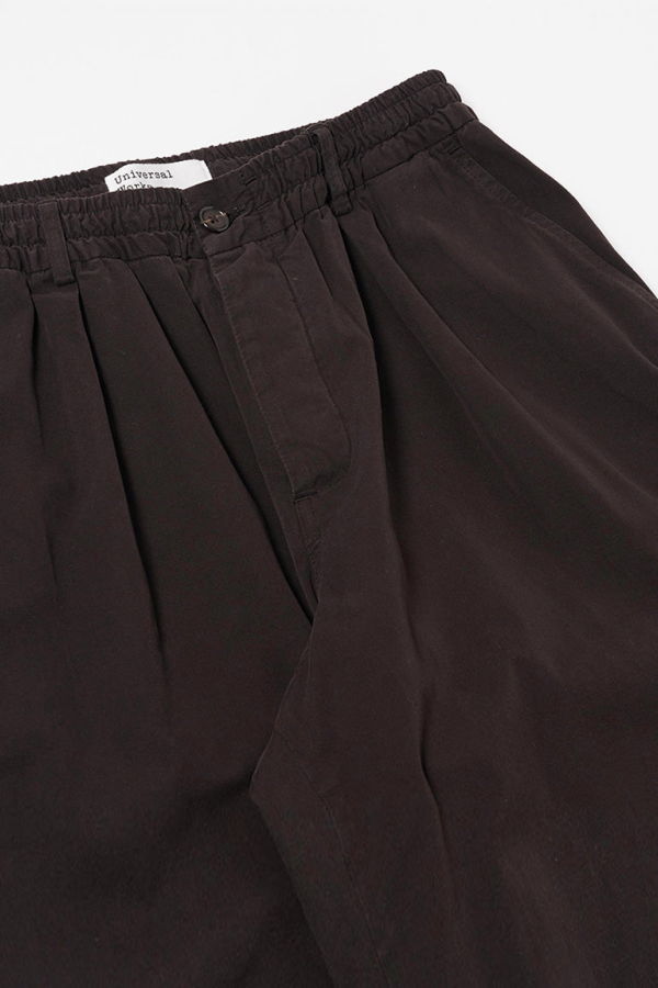 Universal Works Pleated Track Pant in Licorice Canvas Trousers