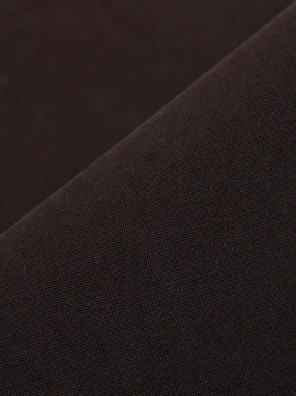 Universal Works Pleated Track Pant in Licorice Canvas Trousers