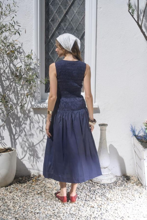 Moon River Sleeveless Smocked Shirred Waist Midi Dress