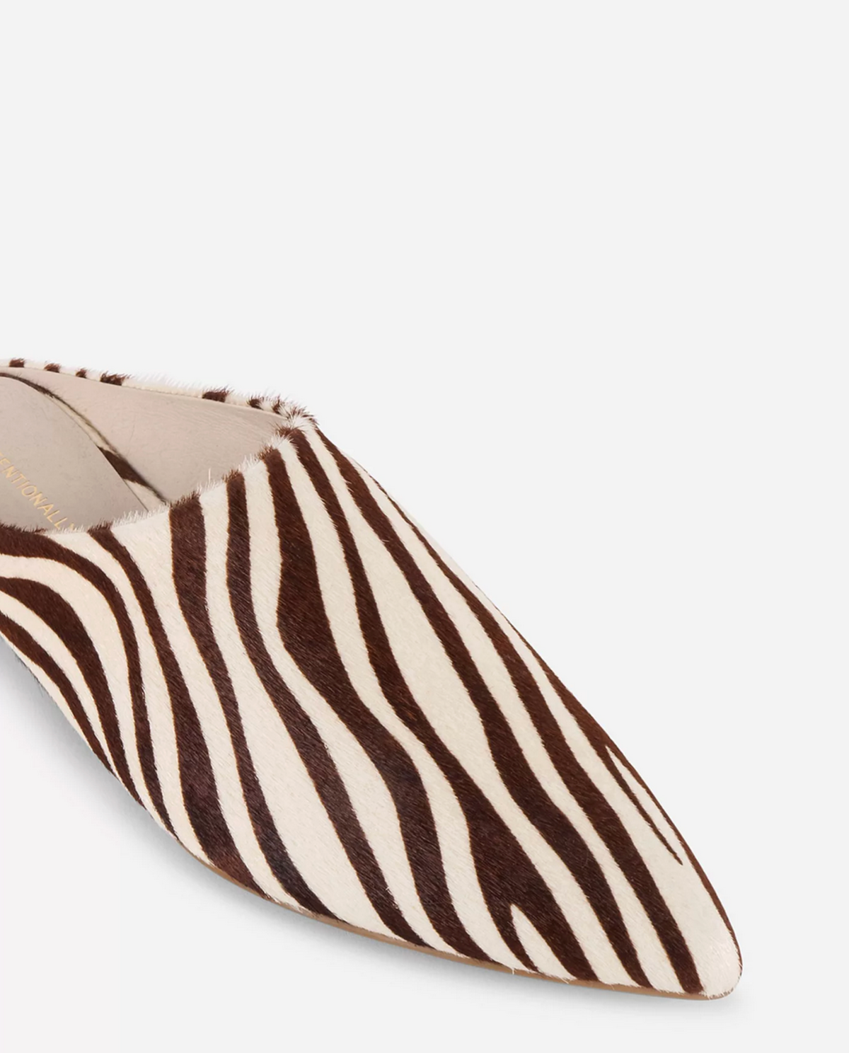 INTENTIONALLY __________. Major Cowhide Flat Mule - Beige Zebra - Image 3 of 4