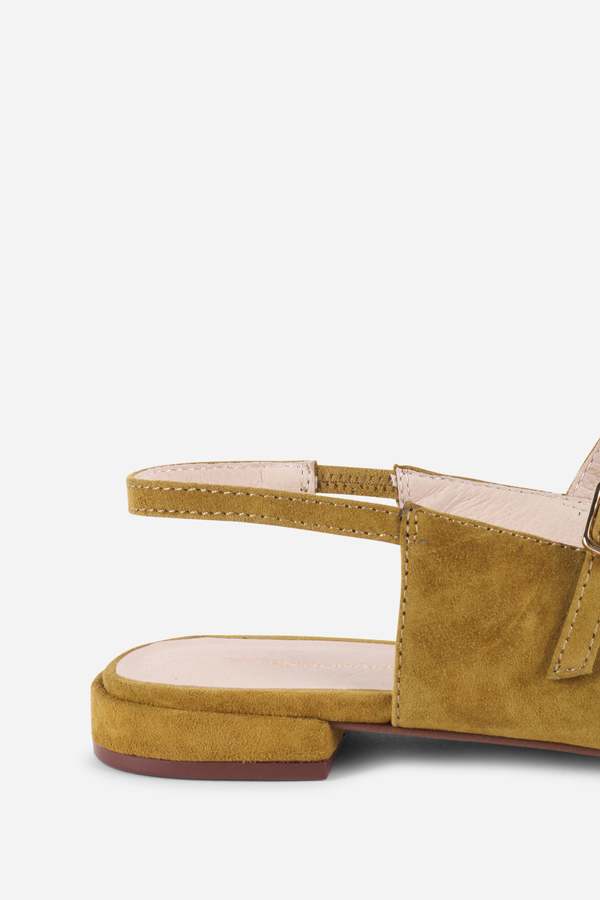 "INTENTIONALLY __________." Escape Slingback Flat