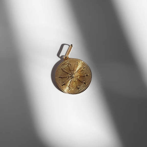 Thatch Sundial Coin Charm