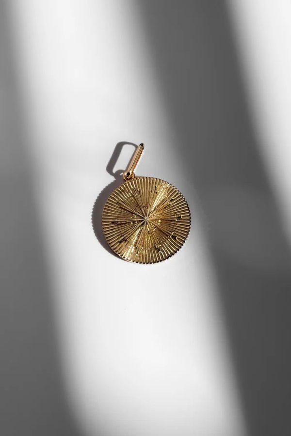 Thatch Sundial Coin Charm