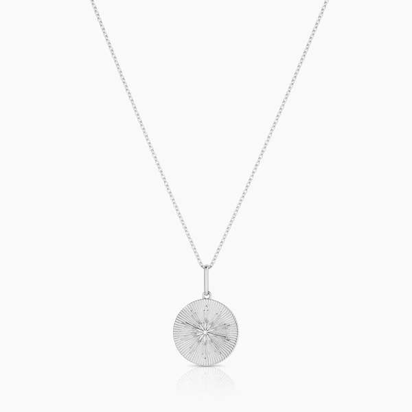 Thatch Sundial Coin Charm