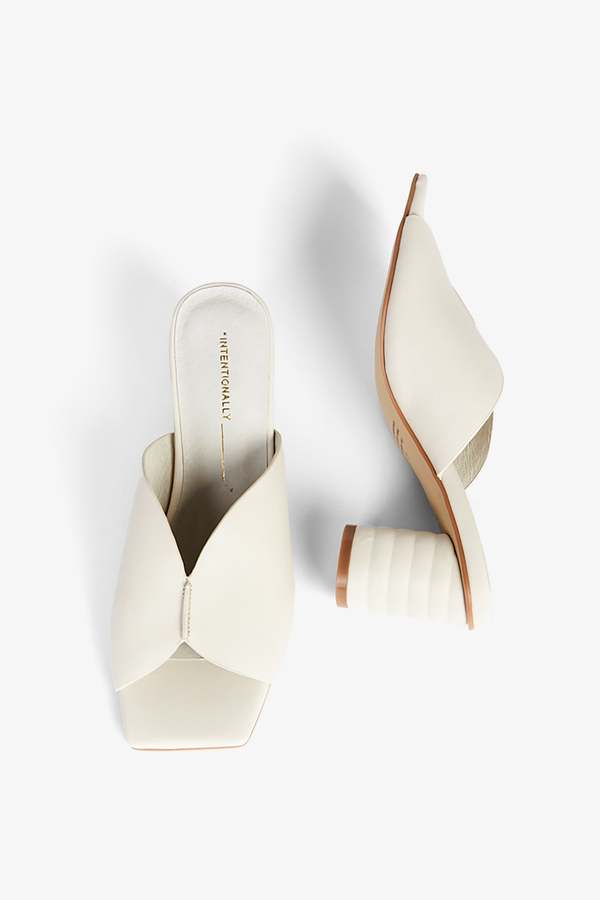 "INTENTIONALLY __________." Kamika Heel - Multi