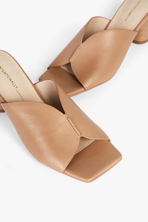 "INTENTIONALLY __________." Kamika Heel - Multi