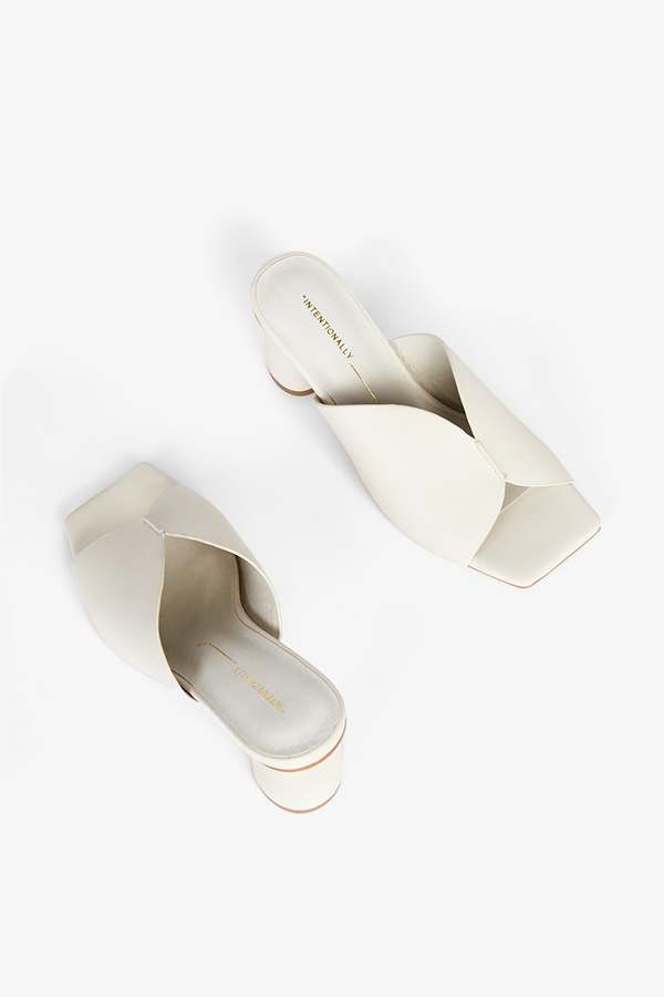 "INTENTIONALLY __________." Kamika Heel - Multi