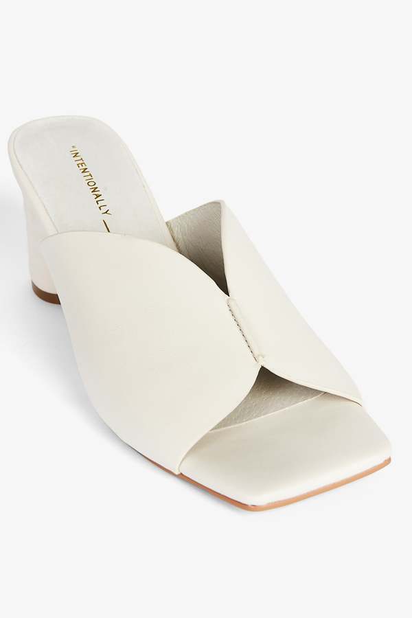 "INTENTIONALLY __________." Kamika Heel - Multi