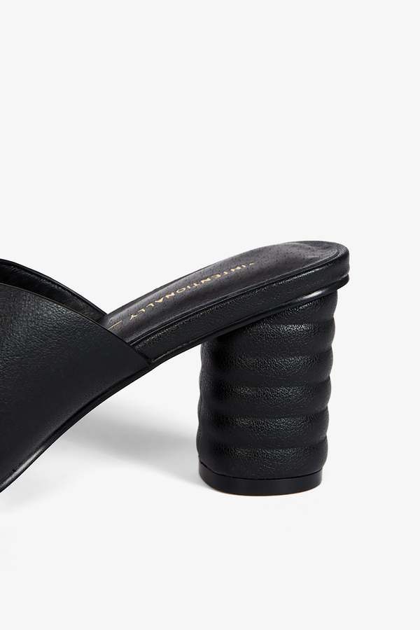 "INTENTIONALLY __________." Kamika Heel - Multi