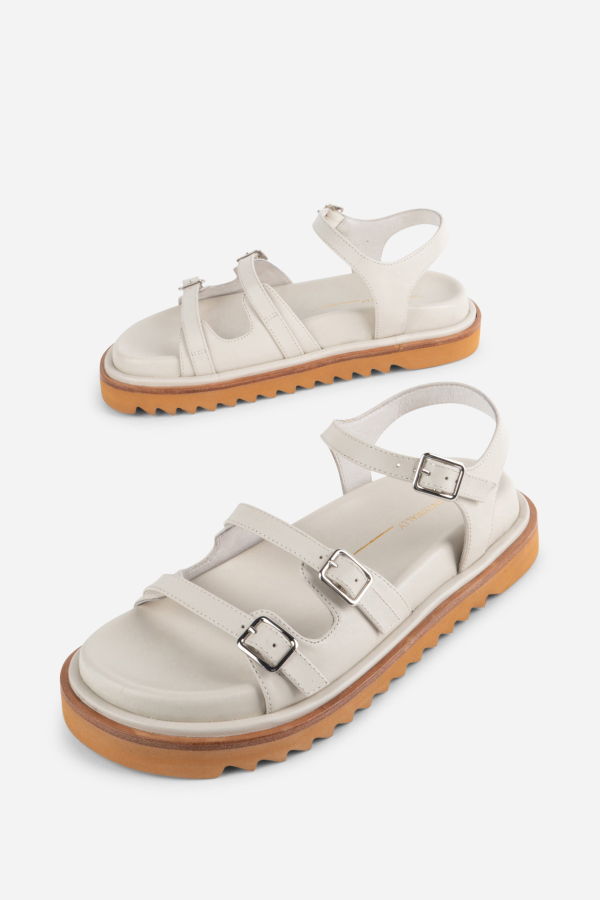 INTENTIONALLY __________. Ricoya Leather Sandal