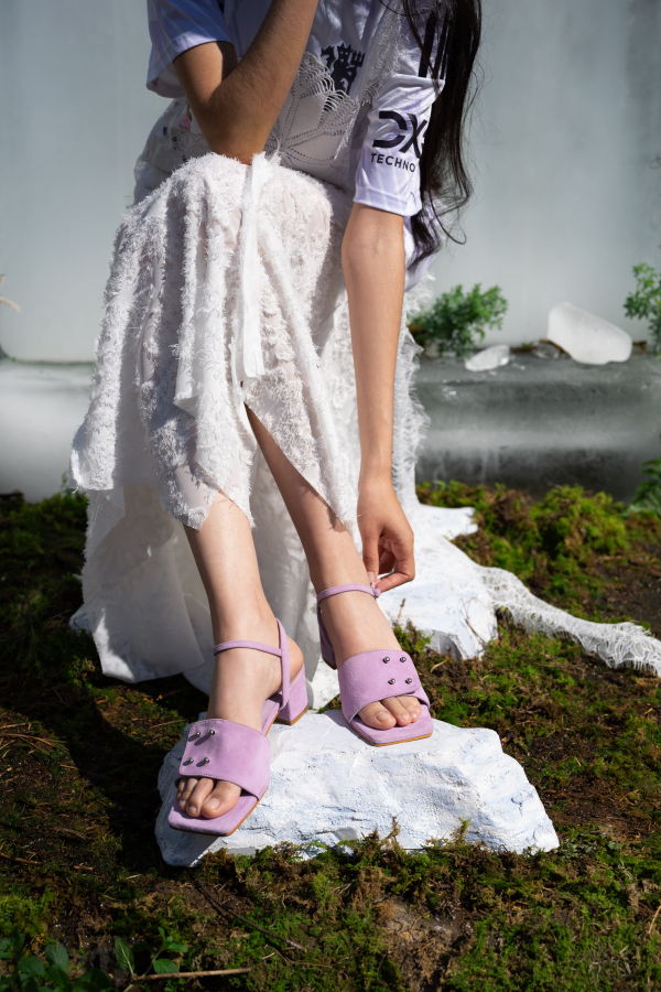 INTENTIONALLY __________. Karizma Block Heel Sandal