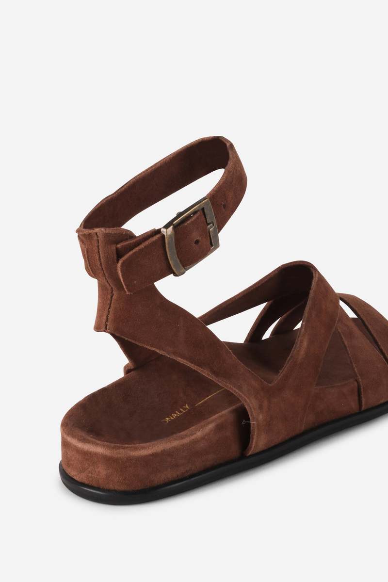"INTENTIONALLY __________." Myko Ankle Strap Flat Sandal