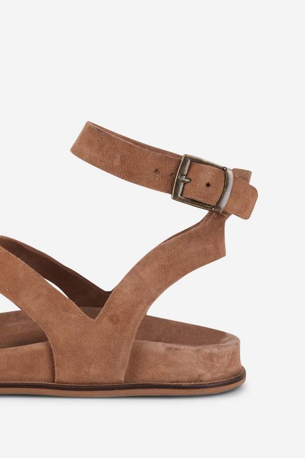 "INTENTIONALLY __________." Myko Ankle Strap Flat Sandal