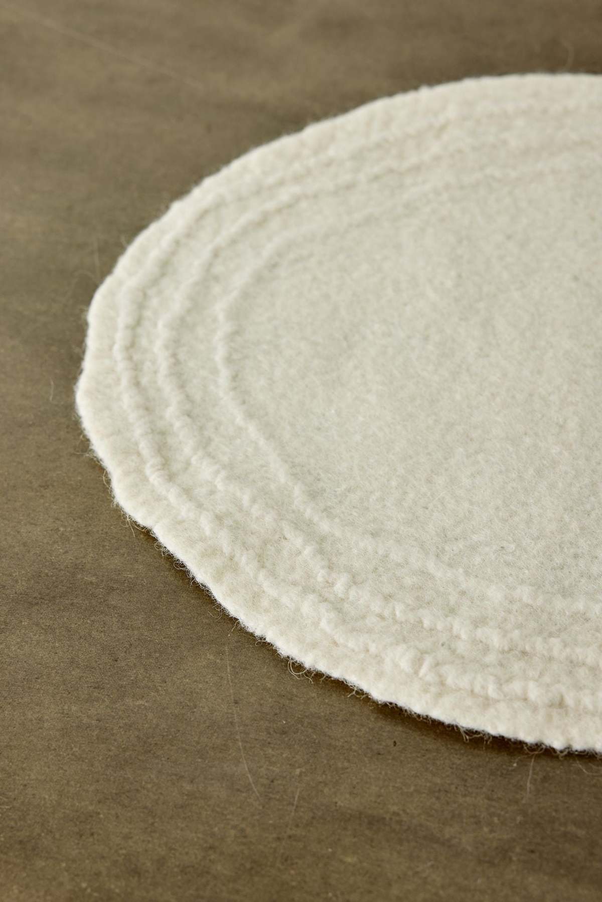 Kanju Interiors Ivory White Merino Wool Oval Placemat - Image 4 of 4