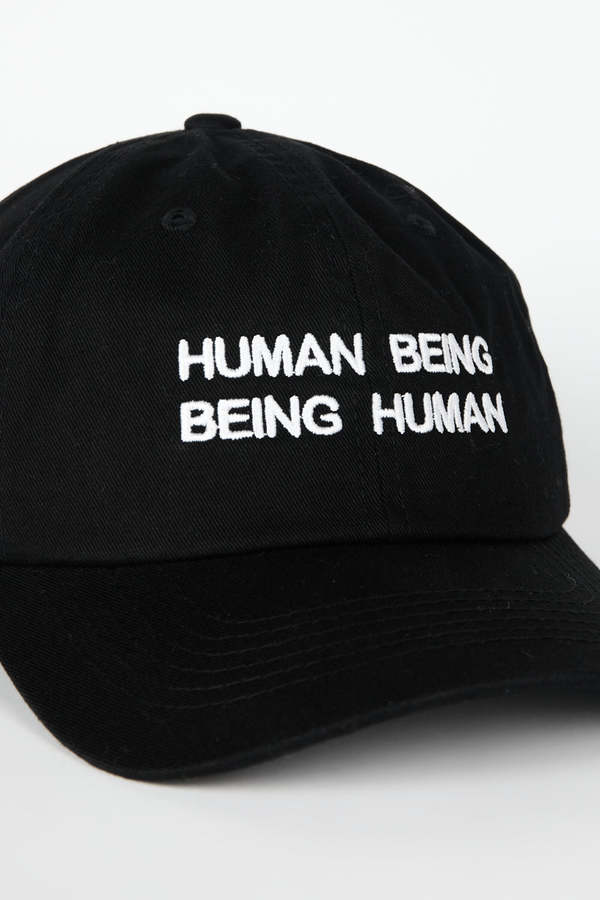 "INTENTIONALLY __________." Human Nature Dad Cap