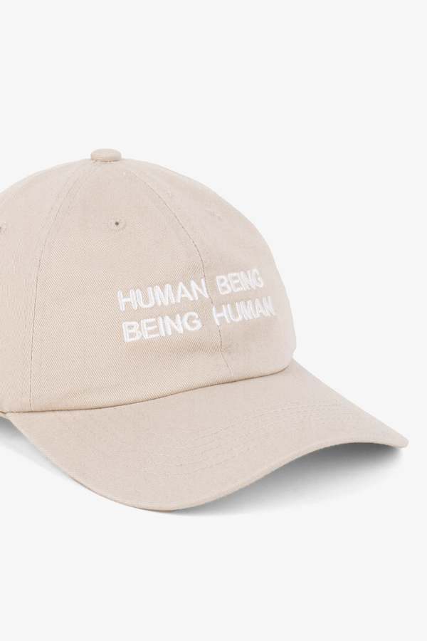 "INTENTIONALLY __________." Human Nature Dad Cap