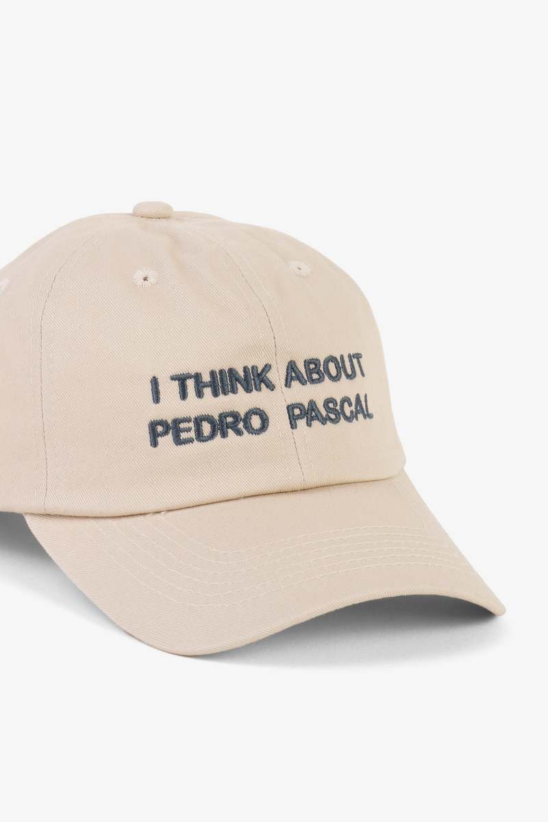 "INTENTIONALLY __________." Pedro Pascal Dad Cap
