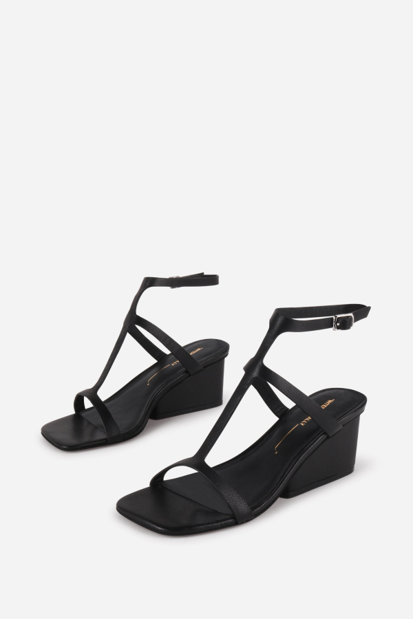 "INTENTIONALLY __________." Semy Wedge Heel Sandal