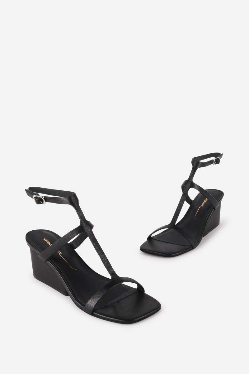 "INTENTIONALLY __________." Semy Wedge Heel Sandal