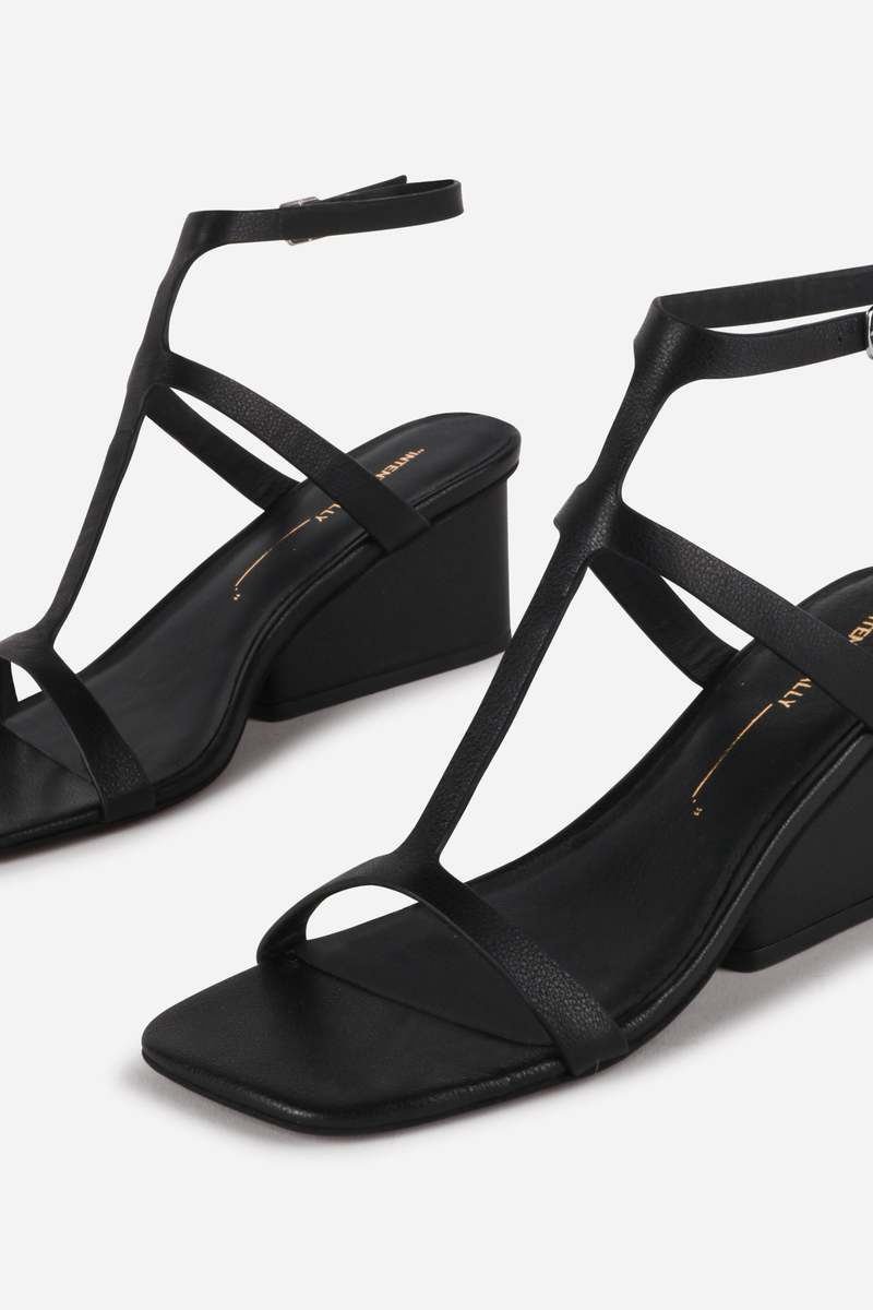 "INTENTIONALLY __________." Semy Wedge Heel Sandal