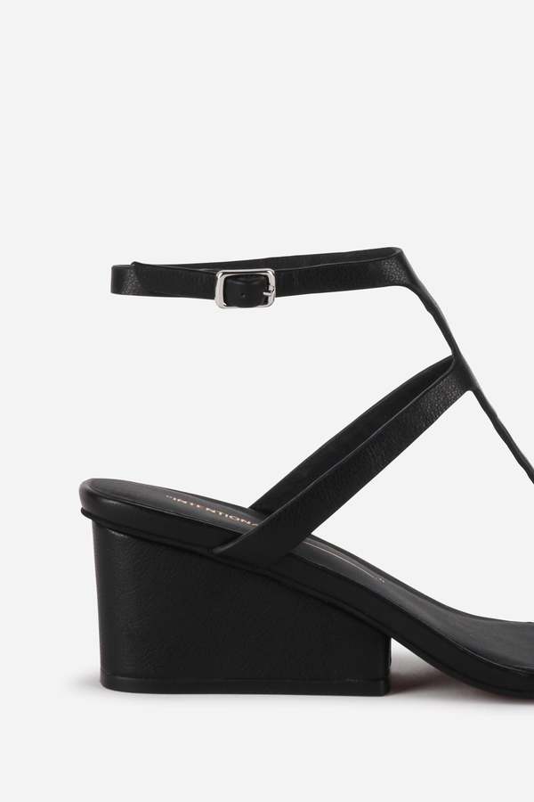 "INTENTIONALLY __________." Semy Wedge Heel Sandal