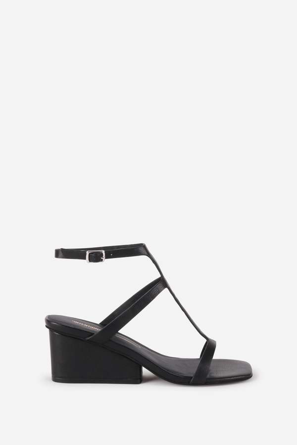 "INTENTIONALLY __________." Semy Wedge Heel Sandal