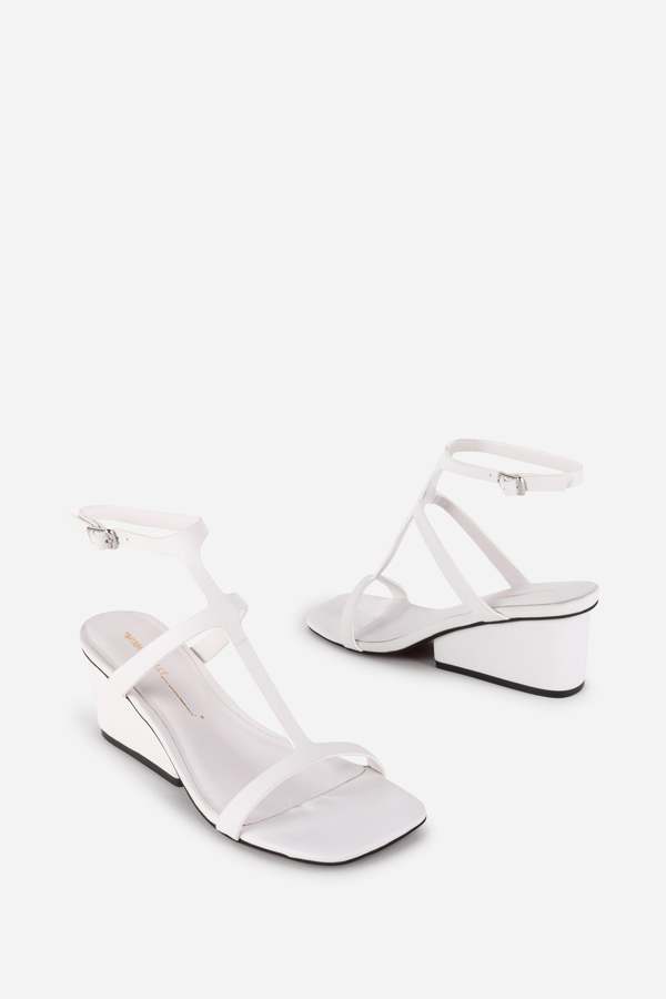 "INTENTIONALLY __________." Semy Wedge Heel Sandal