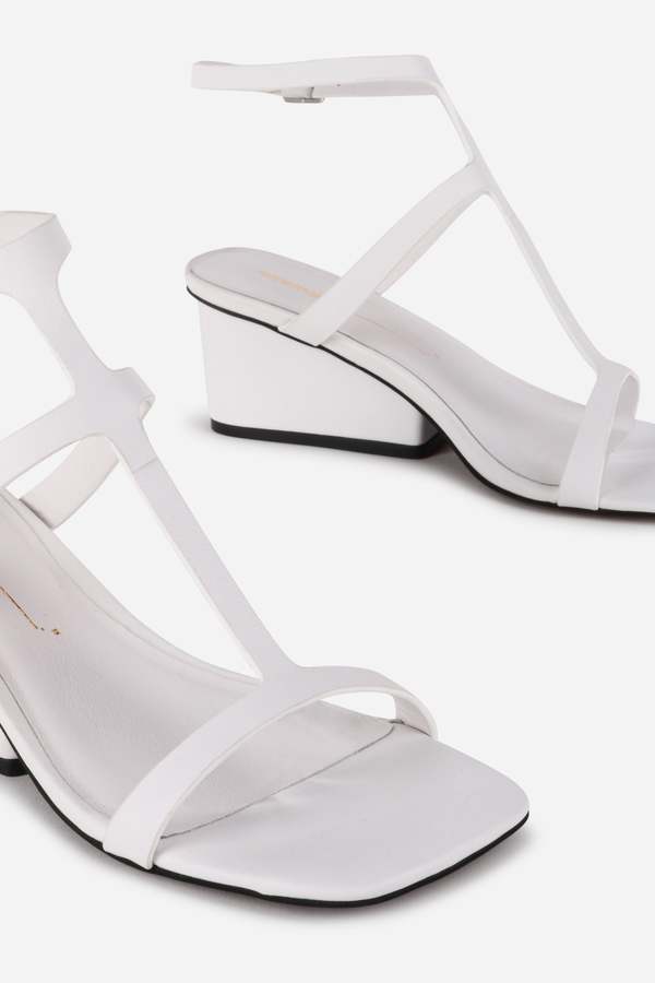 "INTENTIONALLY __________." Semy Wedge Heel Sandal