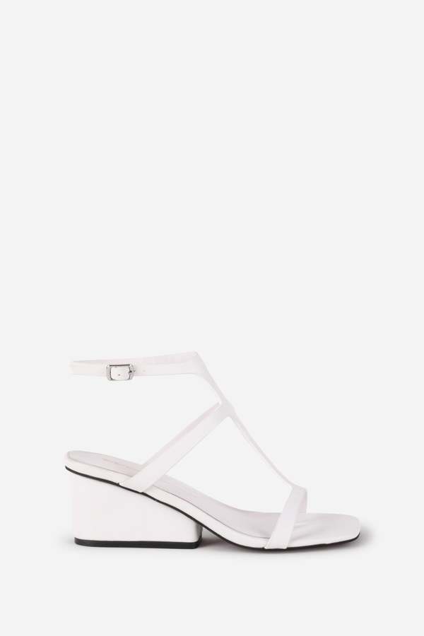 "INTENTIONALLY __________." Semy Wedge Heel Sandal