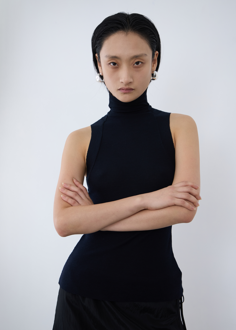 permanent vacation Dissolve Wool Tank