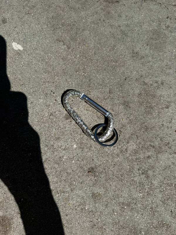 Pas Si Mal Rock Carabiner Keychain