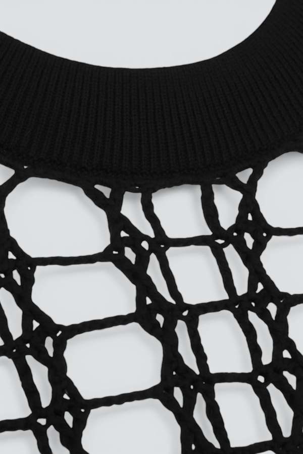 A. Roege Hove Spider Knit Top