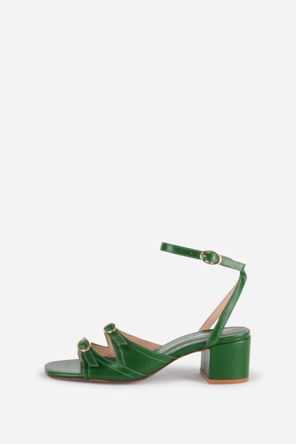 INTENTIONALLY __________. Lingo Heeled Sandals