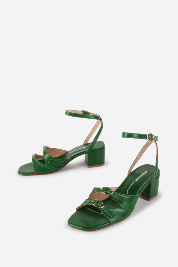 INTENTIONALLY __________. Lingo Heeled Sandals