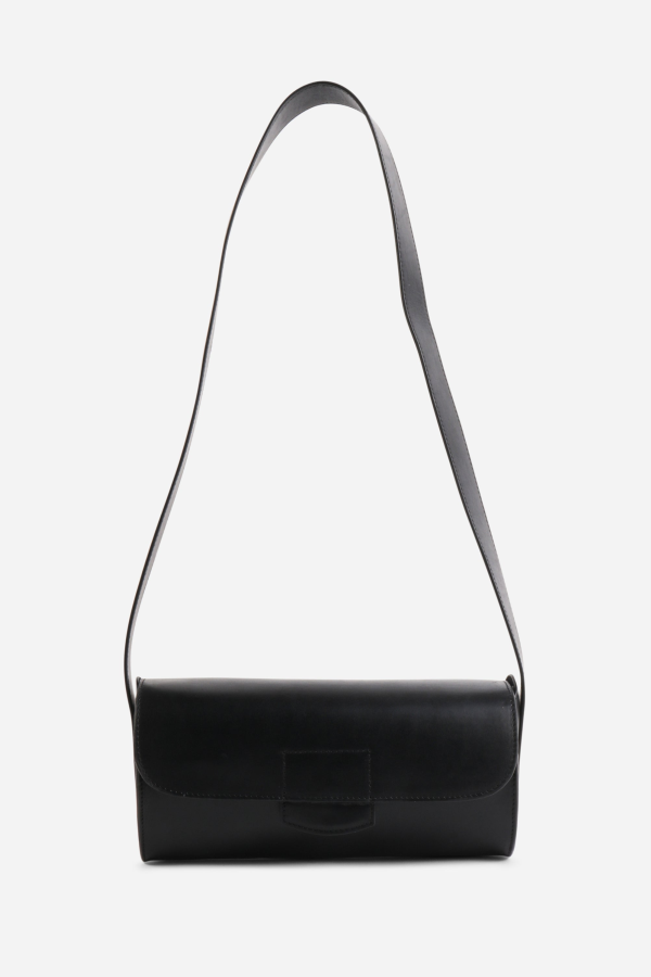 INTENTIONALLY __________. Ryder Tube Bag - Black