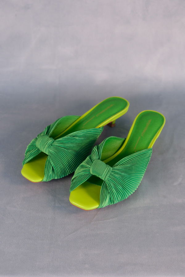 INTENTIONALLY __________. Curfew Heels - Grass