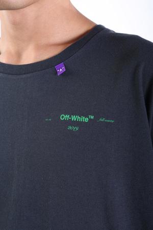 off white black and green shirt