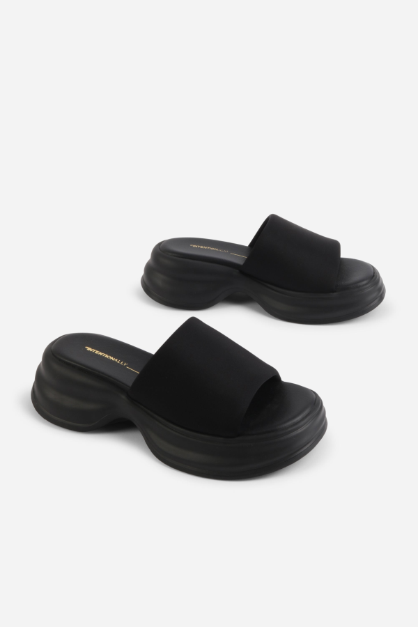 "INTENTIONALLY __________." Murphy Lycra Platform Slide - Black