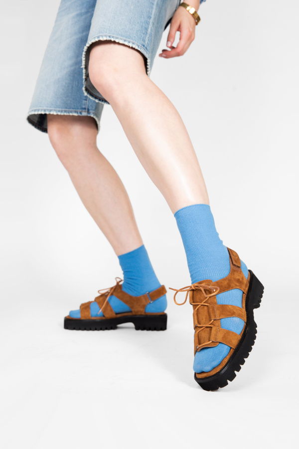INTENTIONALLY __________. Hampton Flat Sandal