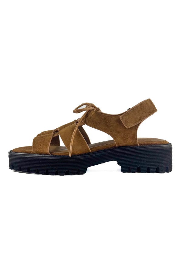 INTENTIONALLY __________. Hampton Flat Sandal
