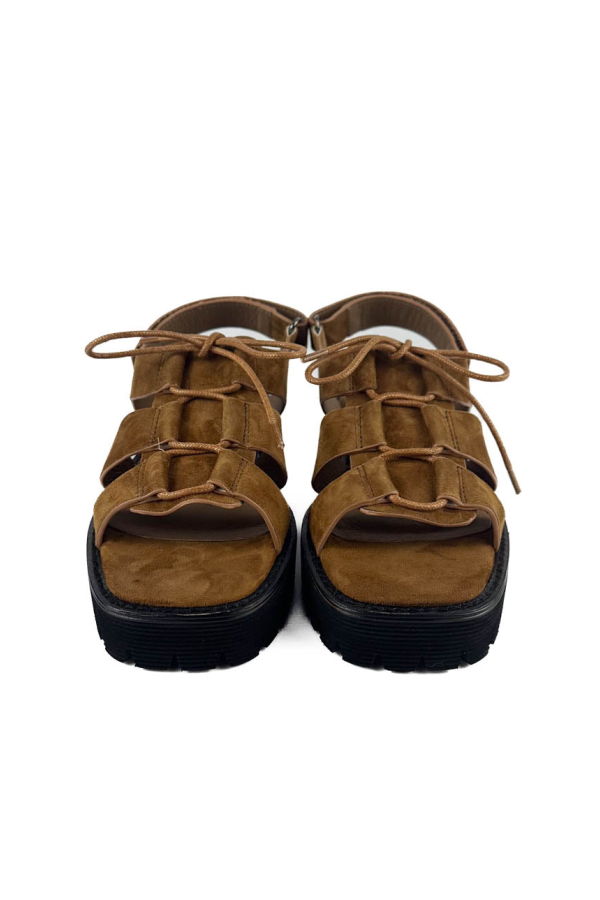INTENTIONALLY __________. Hampton Flat Sandal