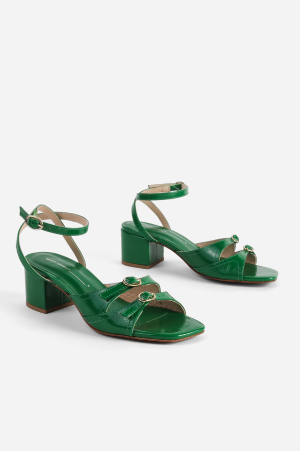 INTENTIONALLY __________. Lingo Block Heel Sandal