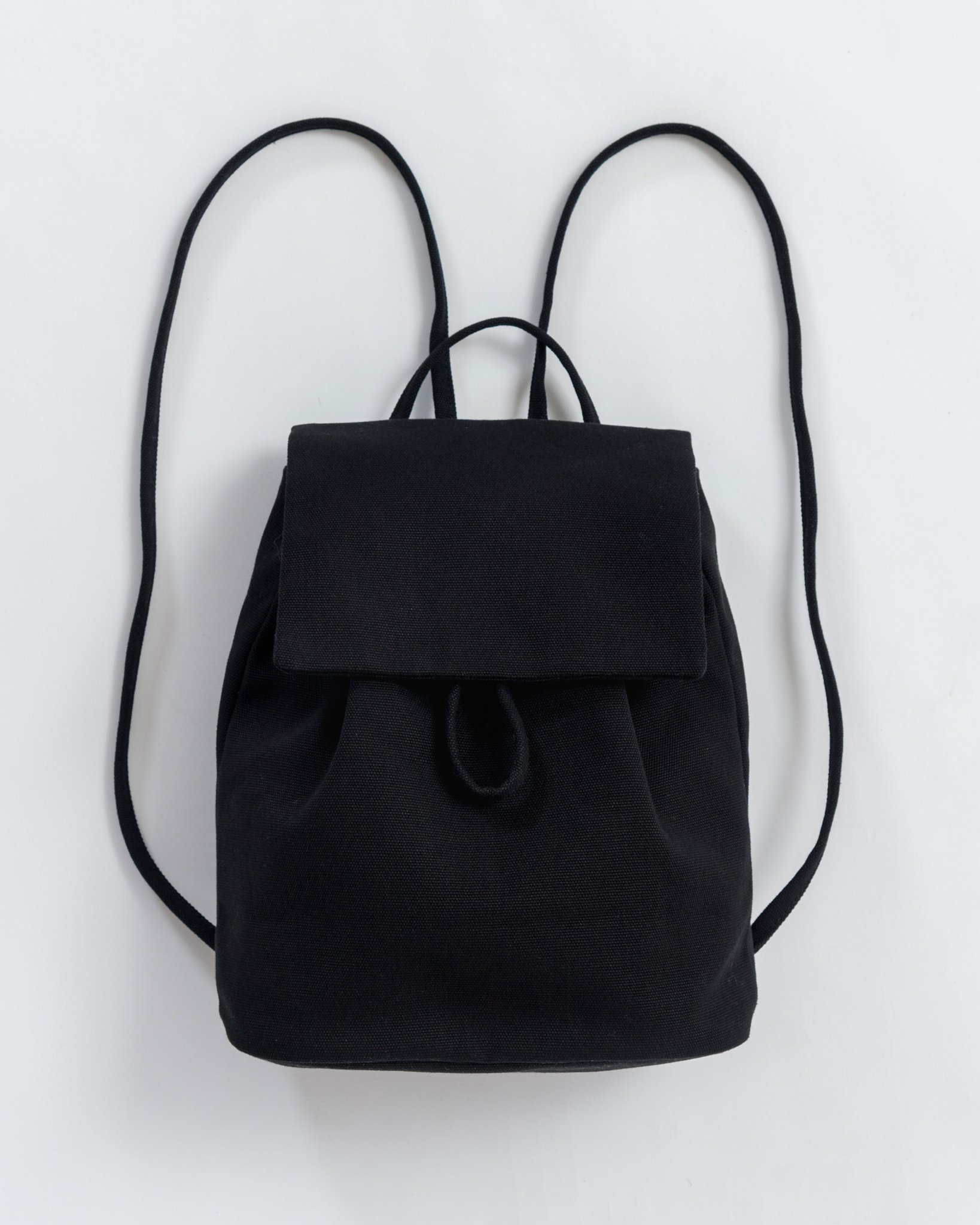 baggu small leather backpack Charm Measures 6 H 9 W 3 L 21.5 adjustable strap Interior key leash Baggu Leather Backpack Baggu Canvas