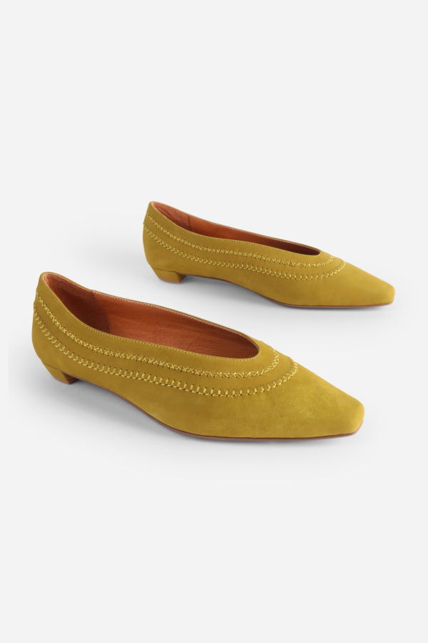 INTENTIONALLY __________. Lofty Snipped Toe Ballet Flat